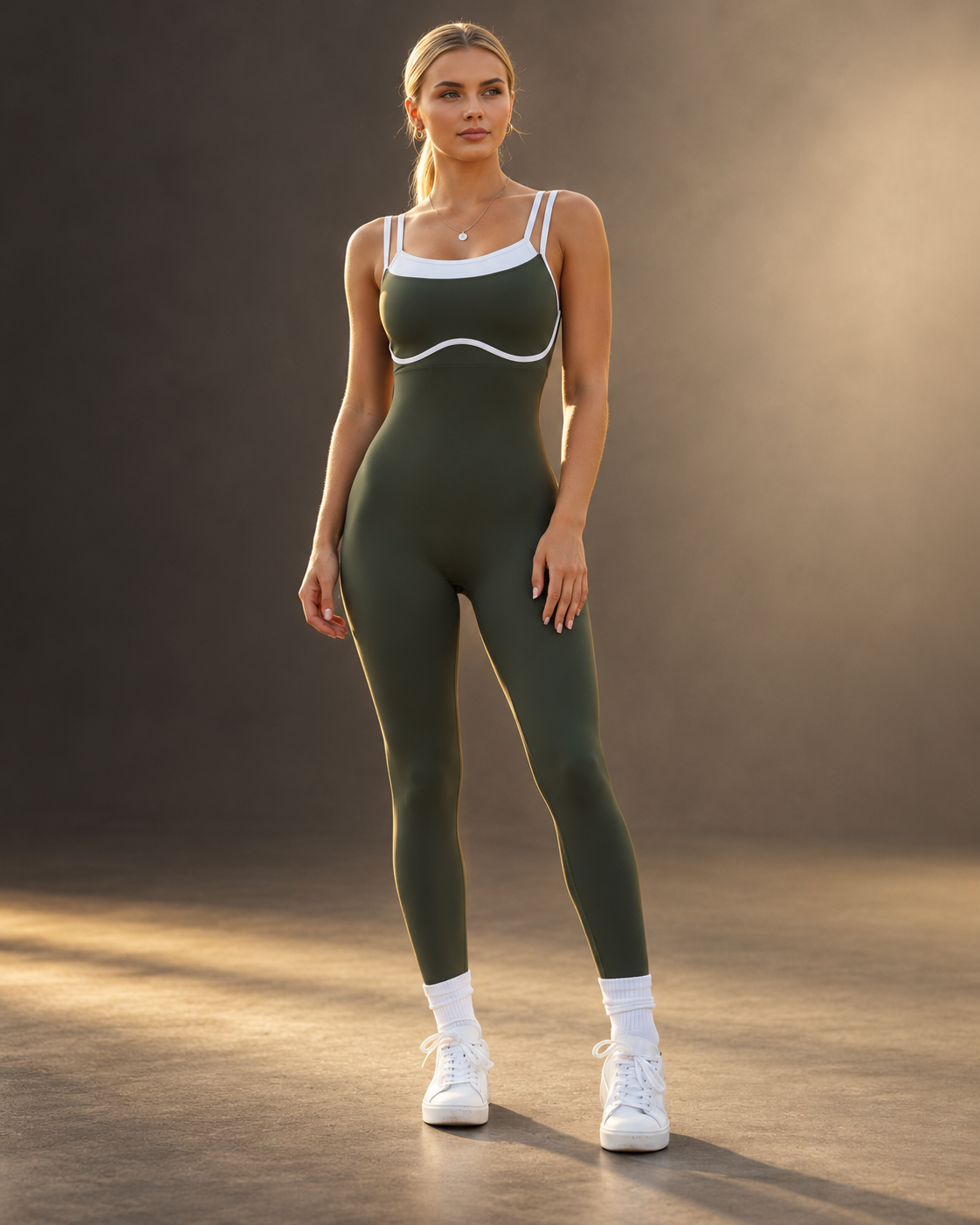 Model wearing green fitness jumpsuit